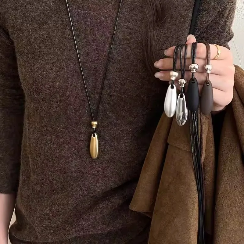 

Metal Water Drop Shaped Pendant Necklace for Women Girls Simple Black Rope Adjustable Long Sweater Chain Fashion Accessory