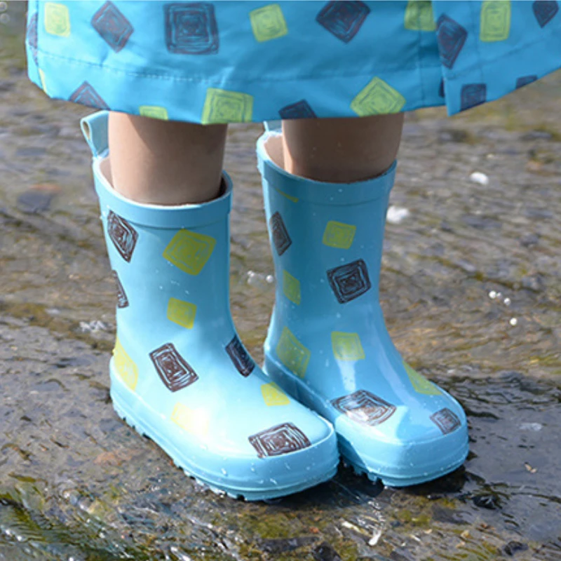 Botas de lluvia de goma para niños y niñas, zapatos impermeables con estampado, a la moda, novedad