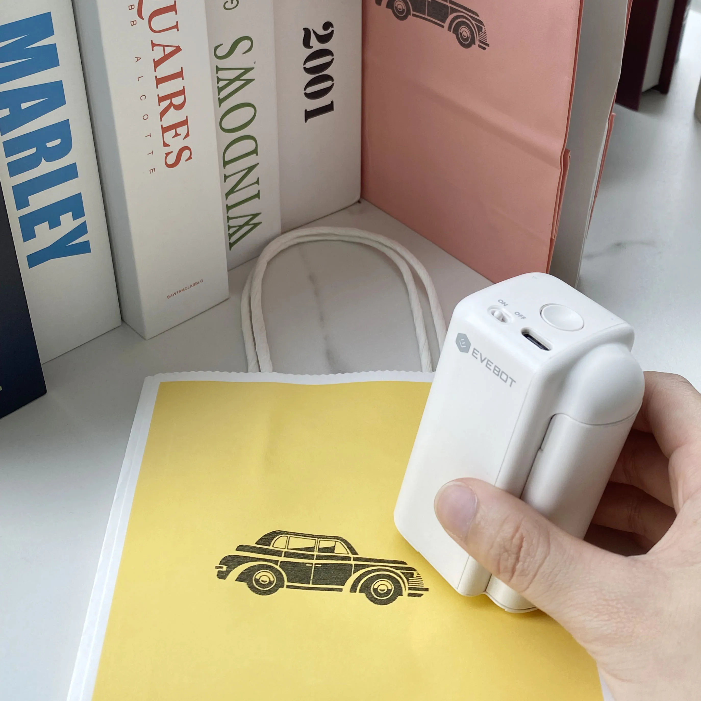 EVEBOT Portable Printer Printpods Mini Inkjet Printers Carton logo
