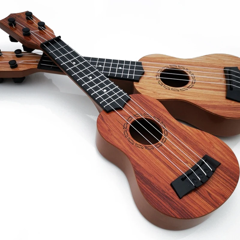Grundschul-Musikgitarrenspielzeug für Kinder mit Paddeln, simuliertes Ukulele-4-Saiten-Instrument