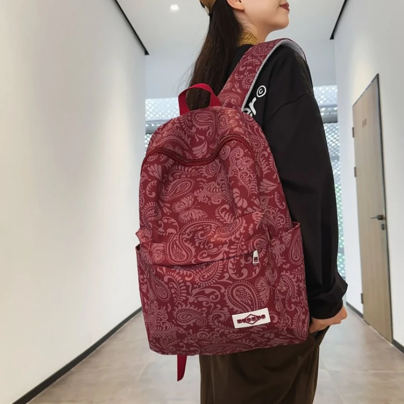 Mochila dulce con estampado personalizado de nailon con cremallera, bolso escolar sencillo e informal para mujer, bolsa de viaje impermeable de gran capacidad 2024