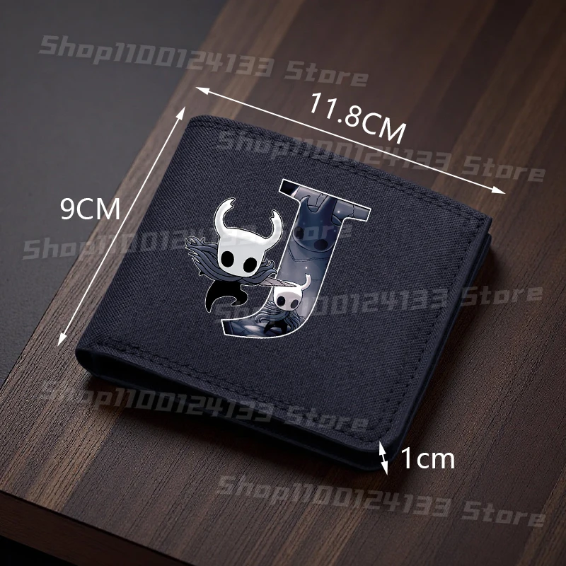 กระเป๋าใส่เหรียญพับได้ลายฮอลโลว์ไนท์ น่ารักสำหรับเด็ก ตัวอักษร A-Z ลายอนิเมะ สำหรับเด็กผู้ชาย กระเป๋าเงินพกพา กระเป๋าใส่บัตร ของขวัญสำหรับงานปาร์ตี้และเกม