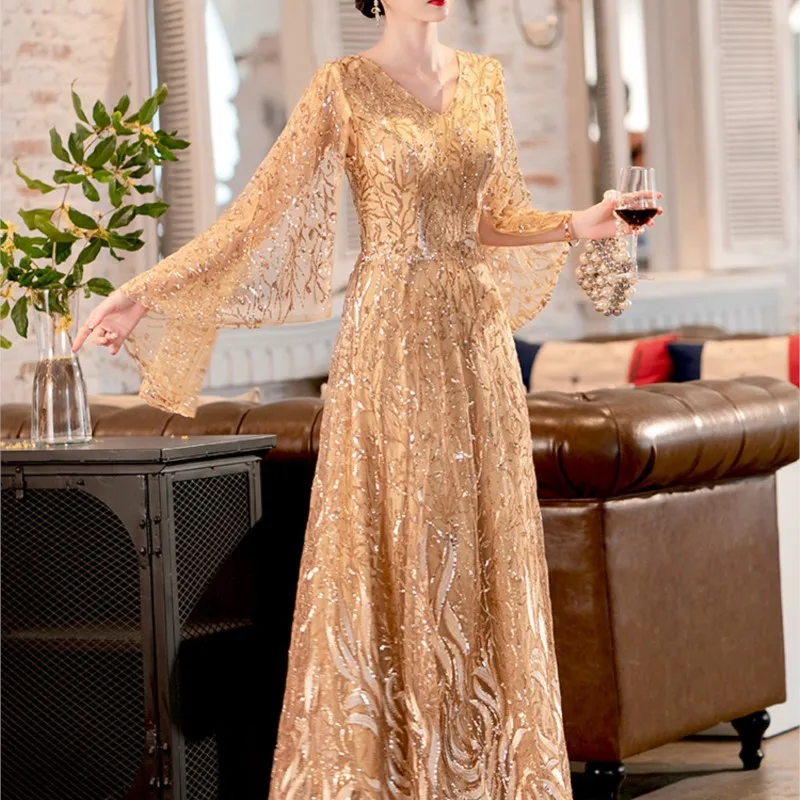 

Gold female sense temperament light luxury will preside over the test costume sequin long dress