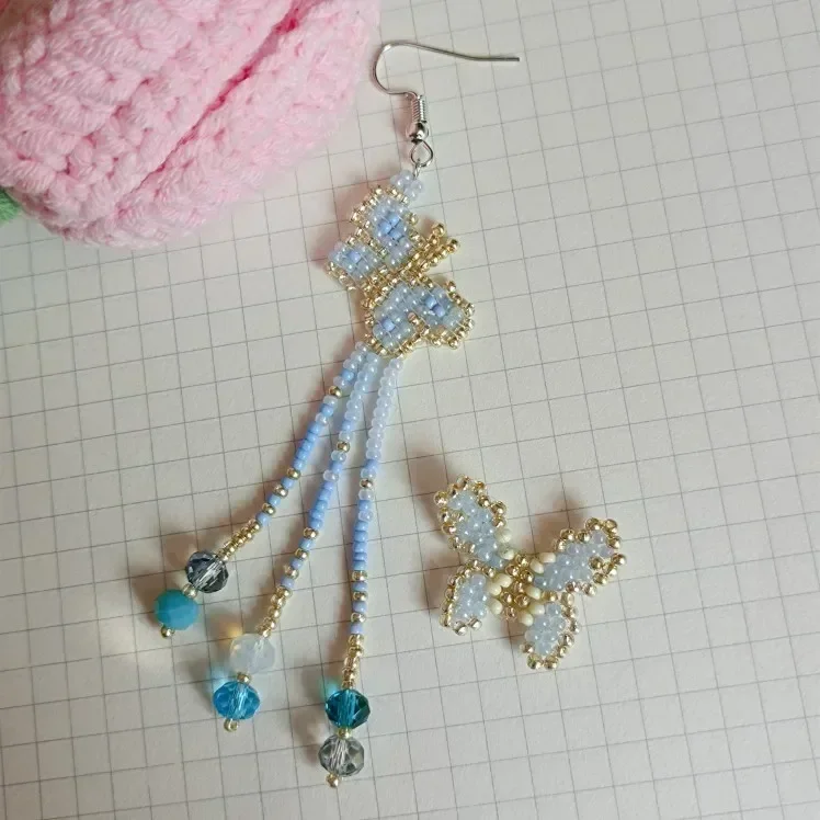 

Серьги из бисера Асимметричные кисточки-бабочки Модный женский дизайн Ручная работа Оригинальность Богемный сплав Серьги из рисовых бусин