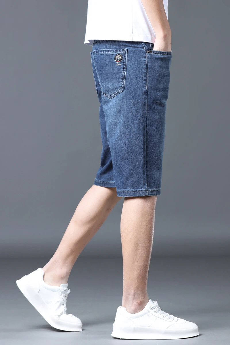 2024 New denim shorts for men's summer  new capris loose straight leg knee length youth elastic cargo jeans  men clothing