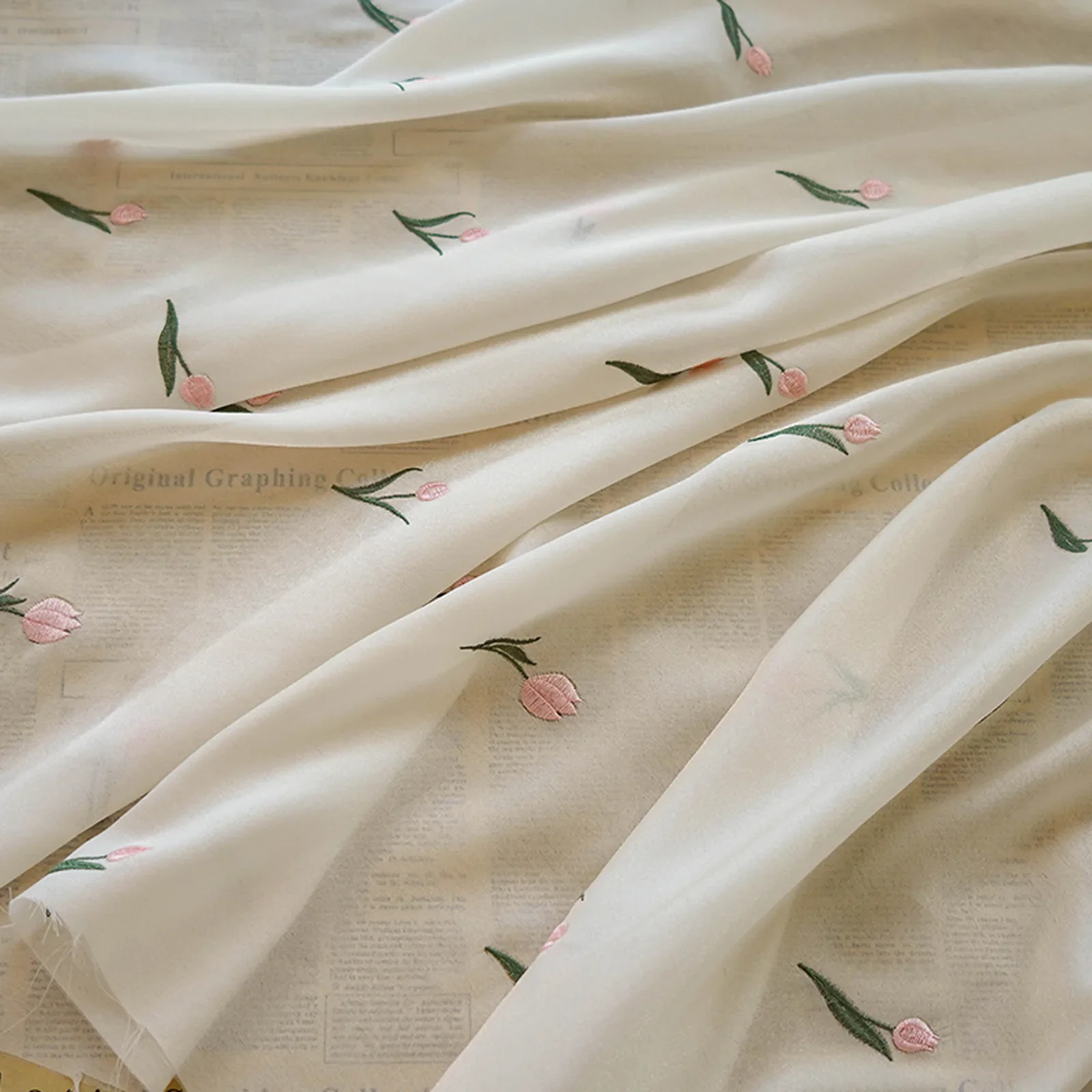 

Exquisite Light Apricot Tulip Embroidery Chiffon Fabric for Elegant Dress Designer Fabric