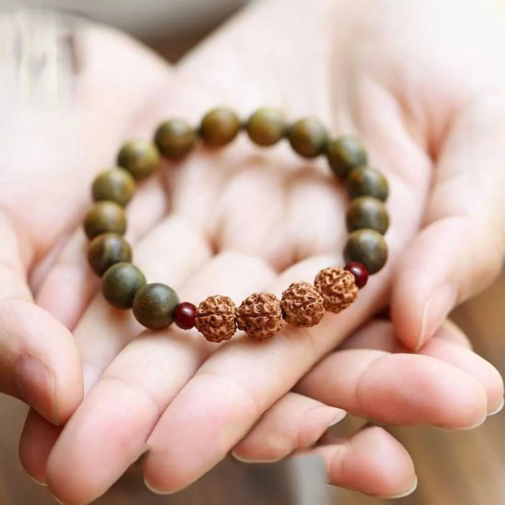 

Beautiful Natural Green wingceltis Rudraksha Bracelet Calming National Style Buddhism Cuff spread Meditation Energy Yoga Yoga