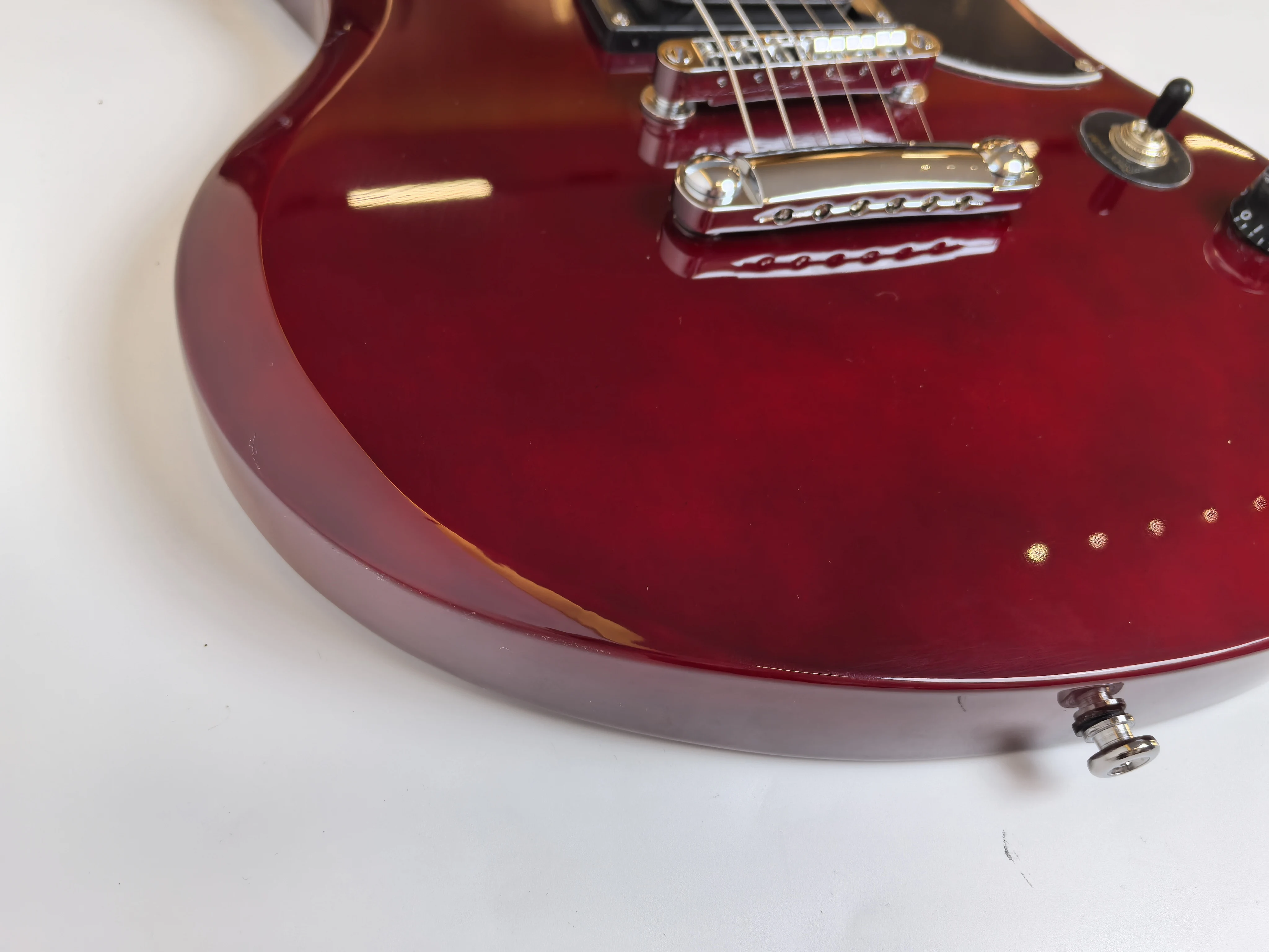 Customizable, wine red 6 string electric guitar, split joint, Augustan body, Augustan head, in stock.