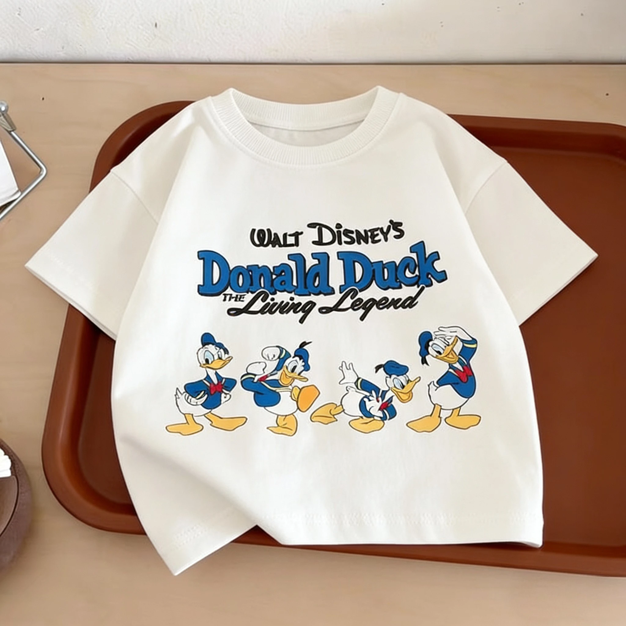 

Футболка с изображением Дональда Дака Диснея, летняя детская одежда, топы с короткими рукавами и принтом мультфильмов, популярный дизайн, футболки с круглым вырезом для маленьких мальчиков