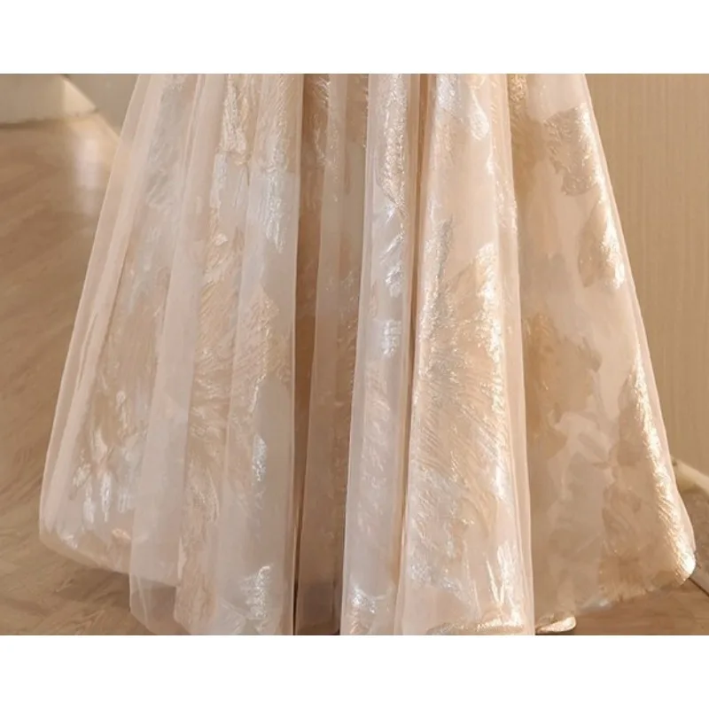 2026 New Women's Spring Festival Golden One Shoulder Evening Dress Fashionable Slimming Annual Meeting Art Exam Host Long Dress