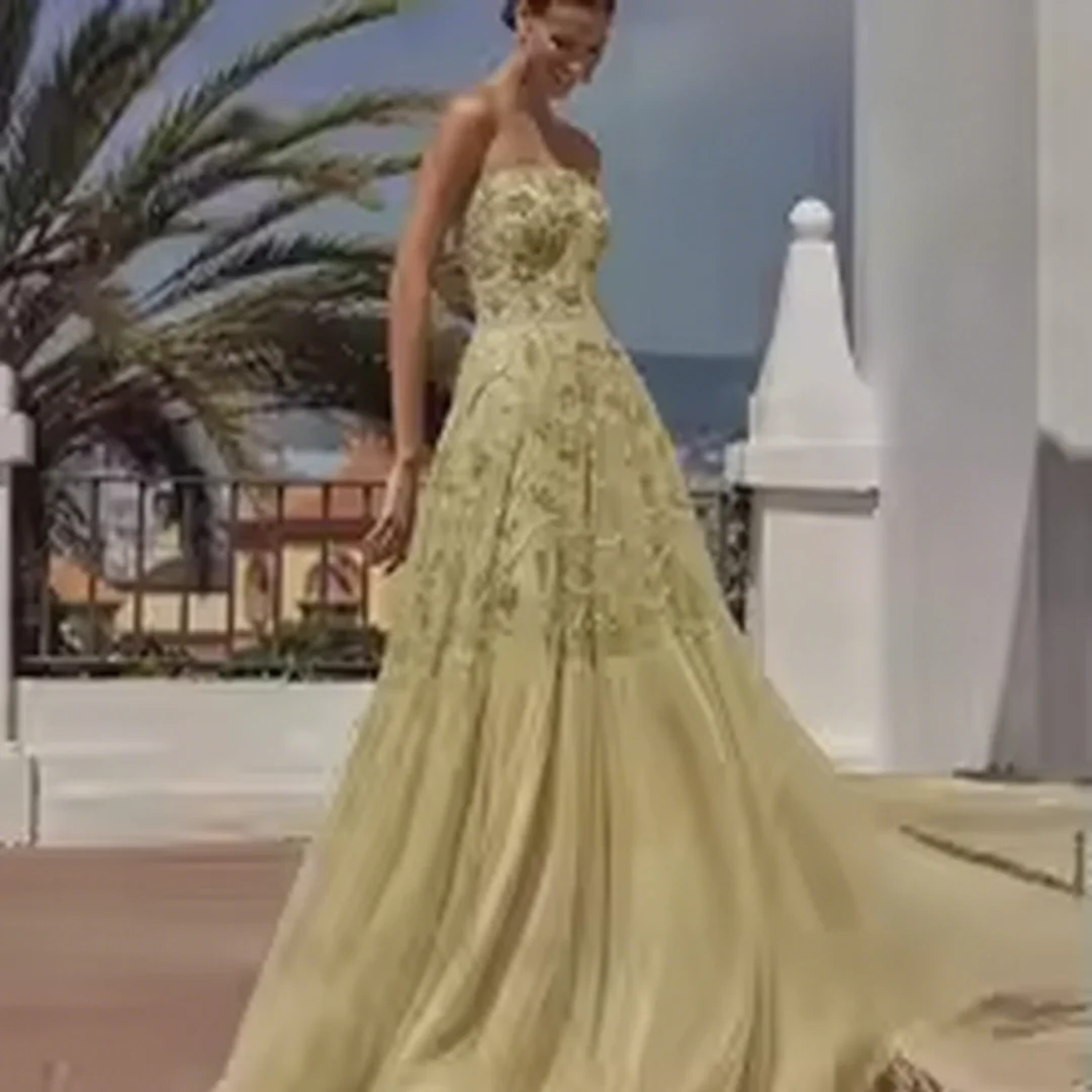 

Customized modern-style off-shoulder embroidered beaded floor-length evening dress for ladies, suitable for formal events.