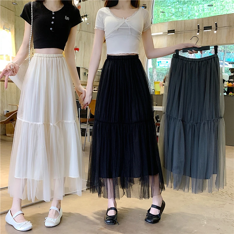 

Весна-лето 2026: Универсальная женская юбка-миди из фатина с эластичным поясом, драпировкой А-силуэта и встроенными шортами