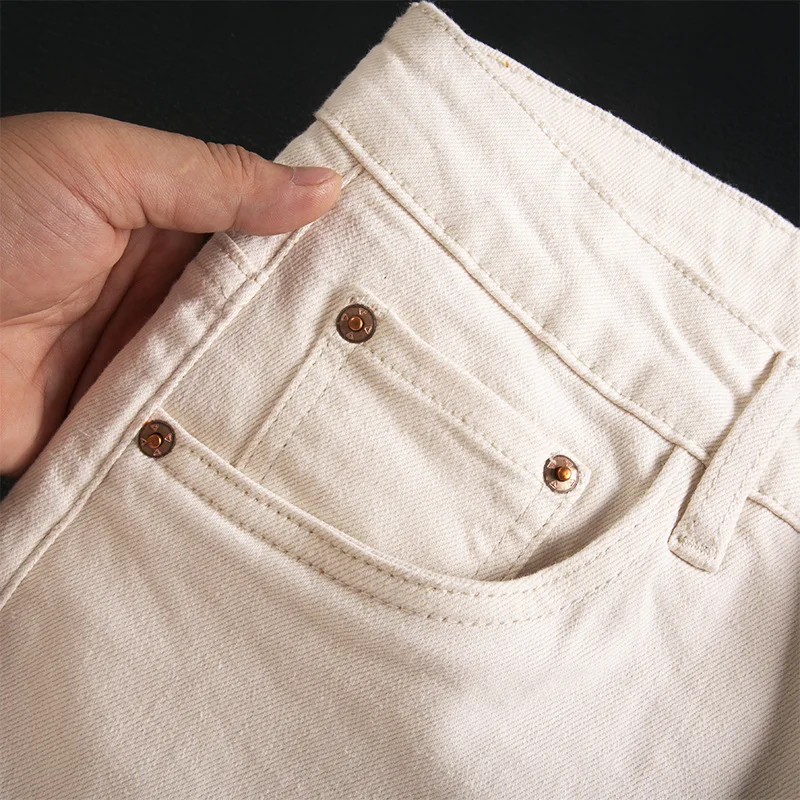 Gebroken witte jeans voor heren, herfst nieuwe trendy stijl, knap en veelzijdig, casual eenvoudige high-end slim fit broek met rechte pijpen