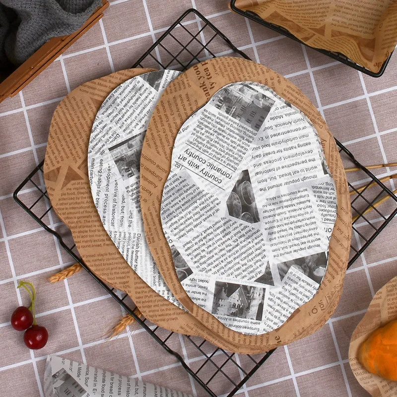 

100Pcs Oval Lace Pad Newspaper Printed Greaseproof Paper Oil Absorbent Hamburger Bread Baking Tray Packaging Supplies