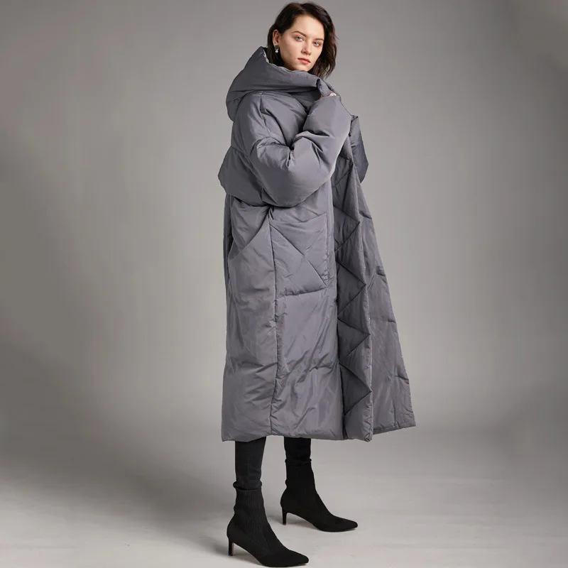 Luxe haute qualité hiver 90 blanc canard vers le bas manteau chaud femmes minimaliste surdimensionné à capuche longue épaisse doudoune dos fente hauts