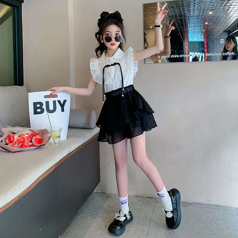 

2024 Summer Girls' New Chinese Flying Sleeve Top+Mesh Shorts Skirt 2pcs Set New Children's Set Princess Fashion Clothing Trend