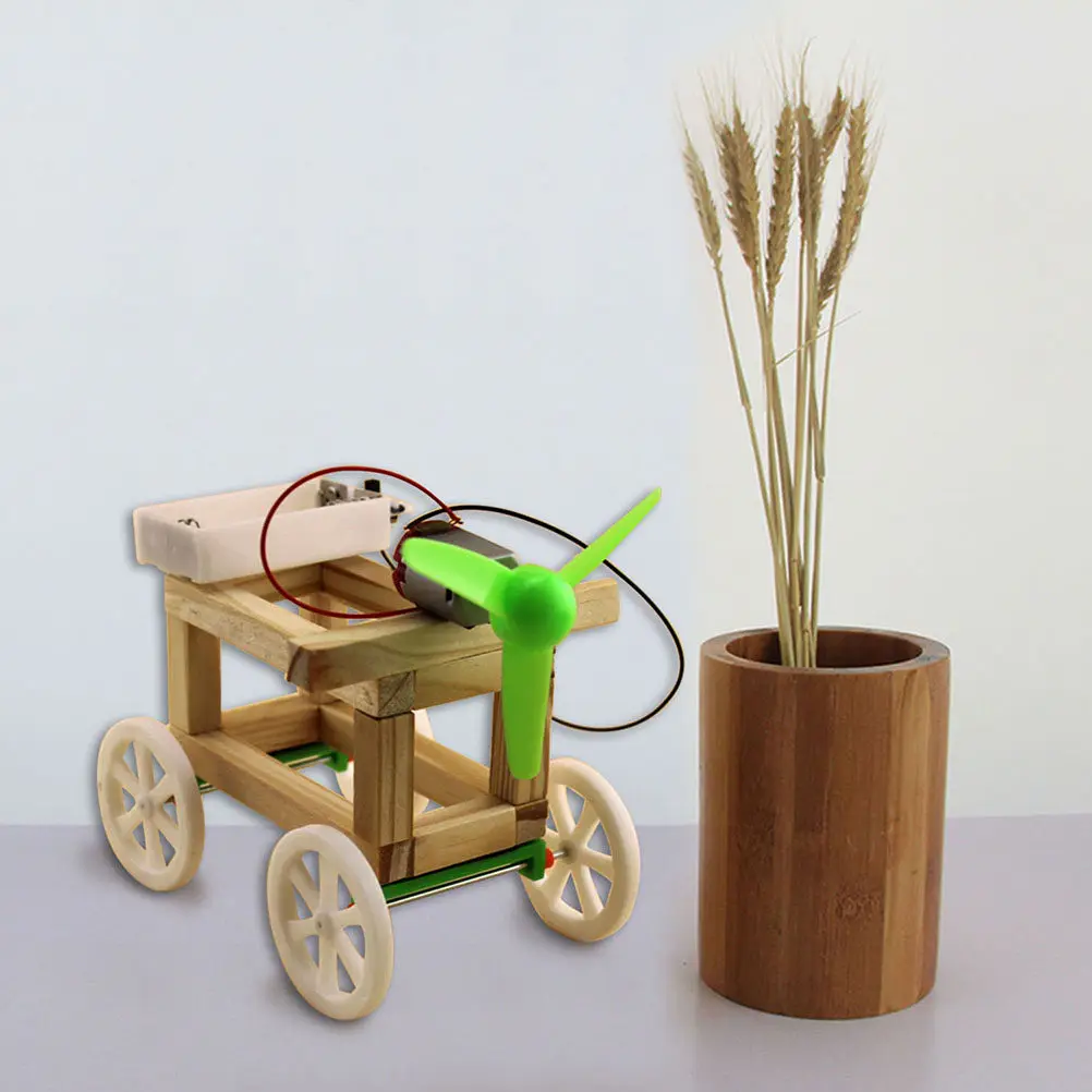 

Mini DIY Wind Powered Car Kit Wooden Buildable Science Experiment for Children Hands on Educational Gadget