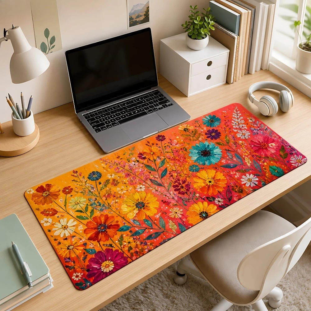 Mouse pad with a gradient background featuring blue, yellow and pink wild flowers. A non-slip desktop decoration accessory.