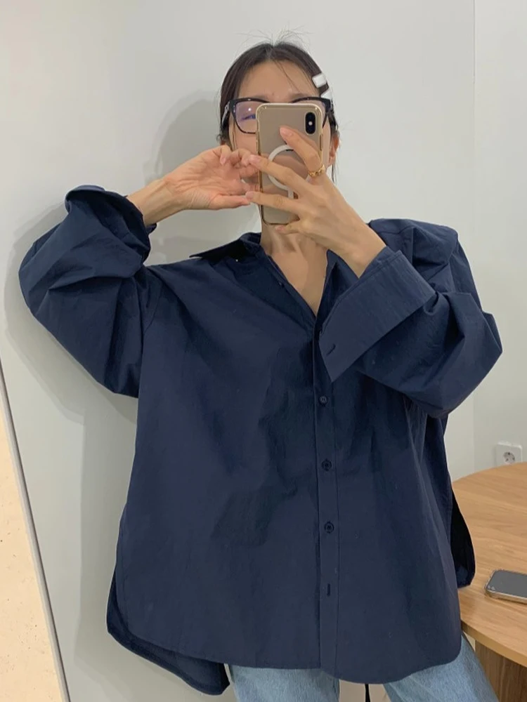 قميص نسائي أنيق فضفاض بدون ظهر بأكمام طويلة وياقة مقلوبة بتصميم كلاسيكي على الطراز الكوري لفصل الربيع المبكر