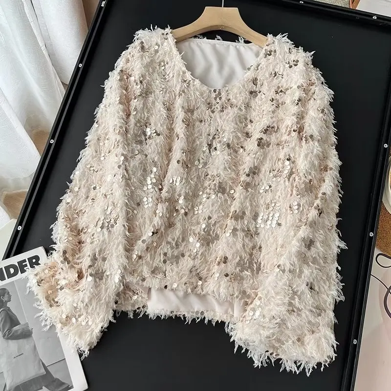 

Autumn and winter new high-grade temperament socialite design sense feather sequin loose pullover blouse woman