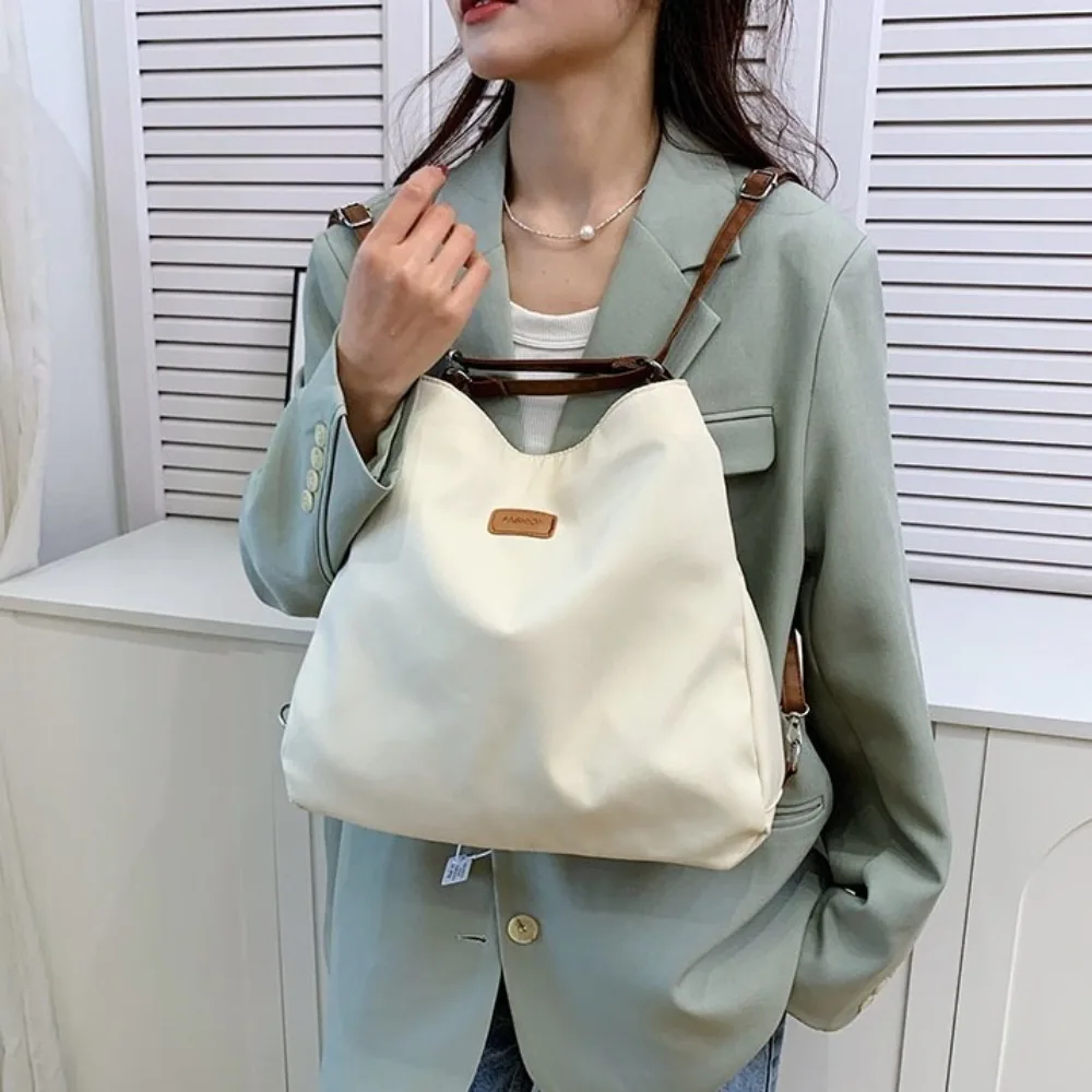 Zaini a tracolla in nylon a doppio uso Borsa tote multifunzionale in tela tinta unita Borsa a secchiello stile coreano Borsa a tracolla per ragazze