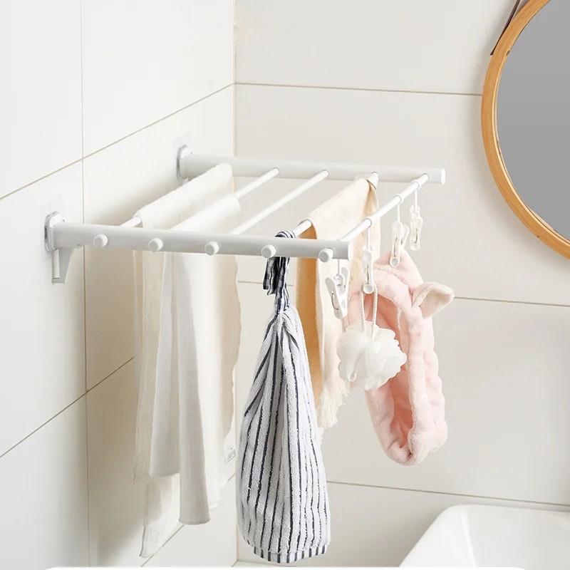 

Indoor and outdoor folding telescopic clothes drying rack seamless sticker free punch balcony hidden simple clothes drying rack