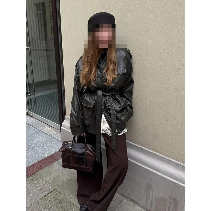 Korean version of niche versatile waist thin medium and long handsome locomotive leather jacket