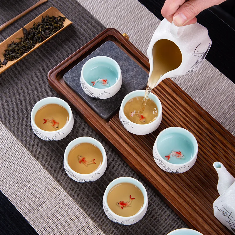 طقم شاي ندفة الثلج طقم شاي الكونغ فو الكامل هدية السمك لكل سنة مكتب الاستخدام المنزلي إبريق الشاي