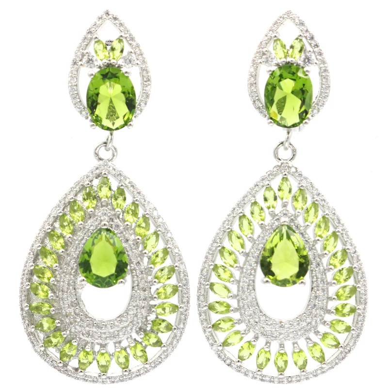 

Buy 5 Get 1 Free 54x24mm Delicate Fine Cut Green Peridot White Sapphire White CZ Ladies Wedding Silver Earrings