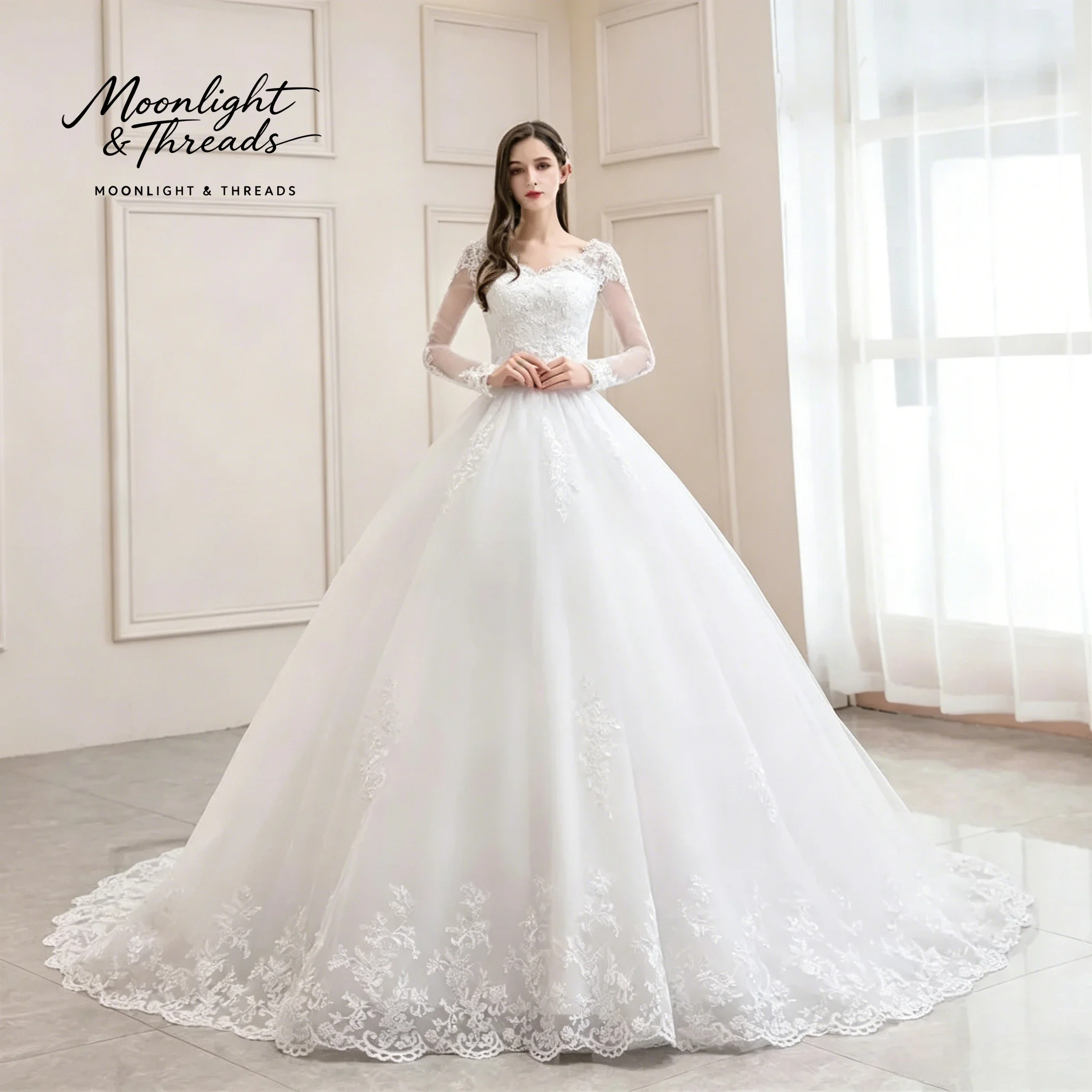 Floor-length formal wedding gown featuring white sheer tulle a V-neck an A-line skirt and French cut-out embroidered lace