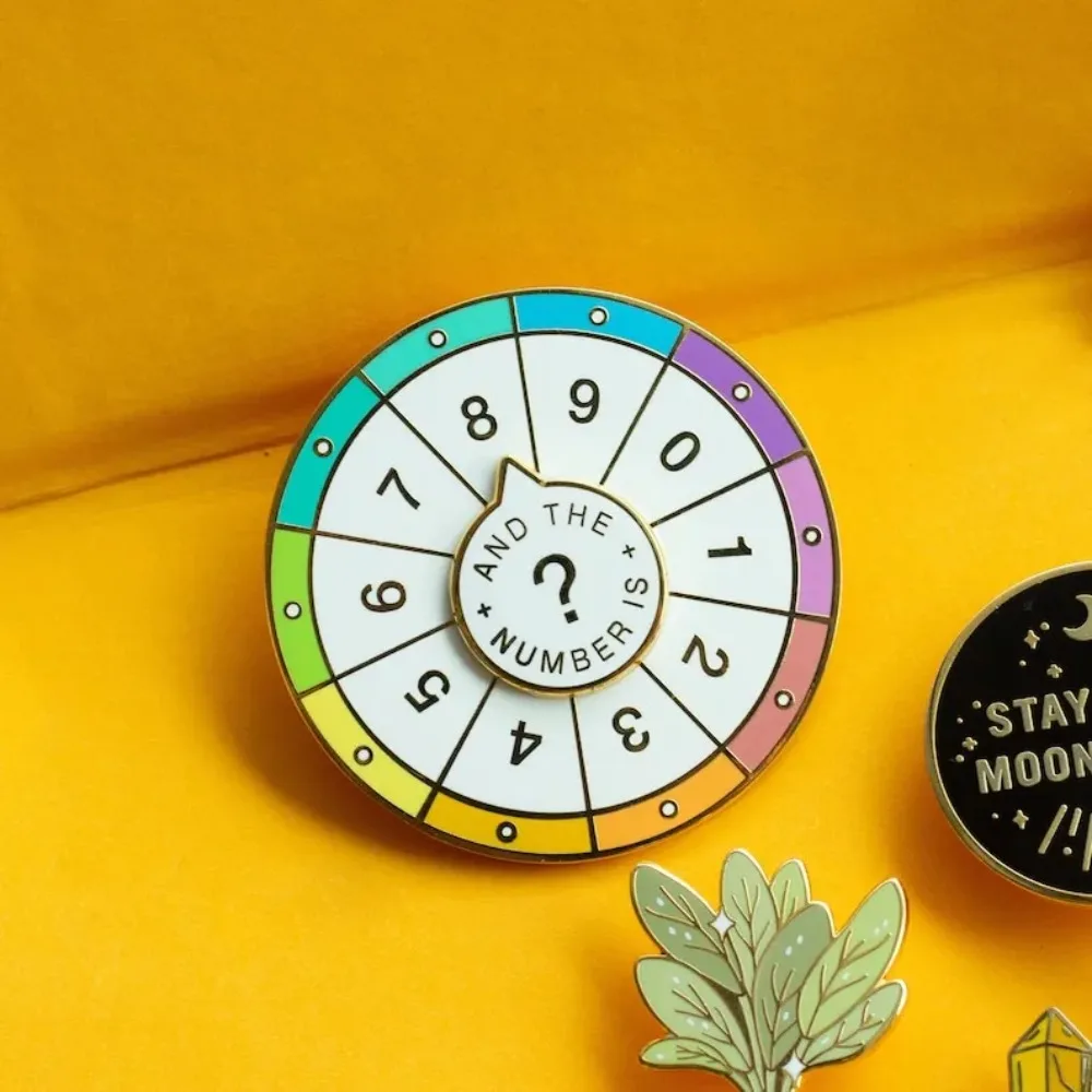 Spinning Numbers Enamel Pin | Interactive