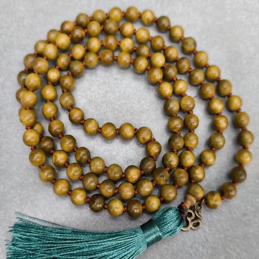 

Natural Golden Phoebe Wood 108 Mala Beads Necklace with Green Tassel Calm & Prosperity Meditation Jewelry