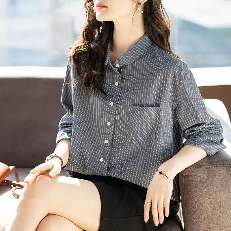 เสื้อเชิ้ตแขนยาวลายทางสำหรับผู้หญิงไซส์ใหญ่ สไตล์ลำลองสำหรับฤดูใบไม้ผลิและฤดูใบไม้ร่วง เหมาะสำหรับใส่ไปทำงาน ทรงหลวม ดีไซน์ทันสมัย เสื้อผ้าแฟชั่นสำหรับผู้หญิง