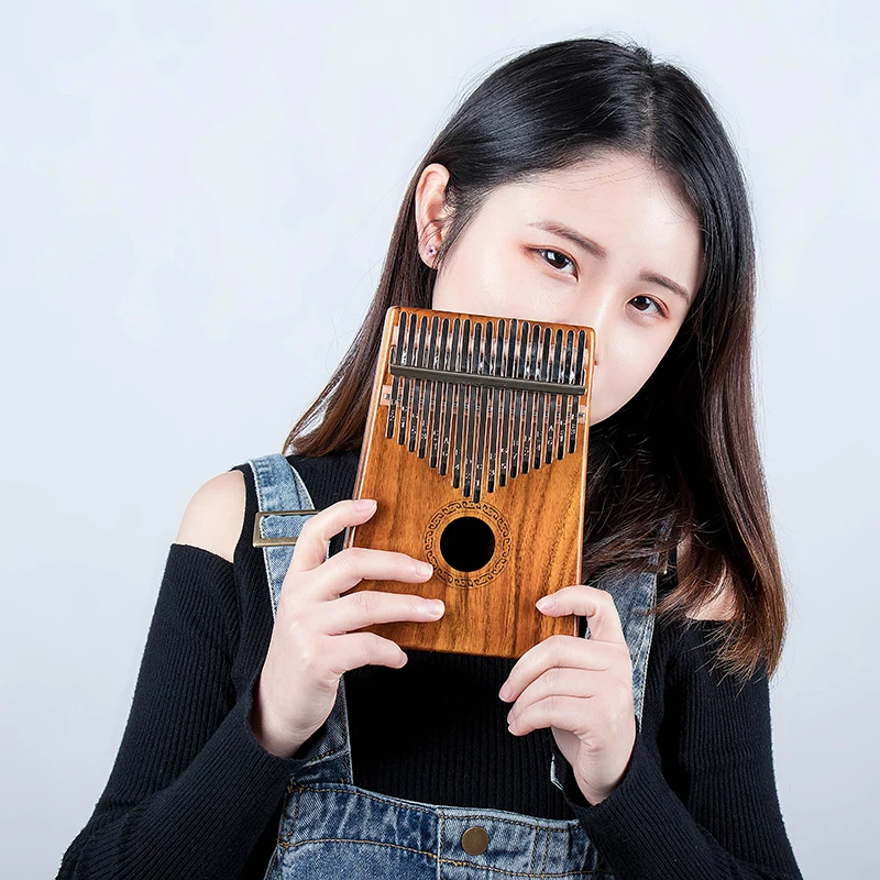 

Suitable for Thumb Piano Kalimba Beginner Starter Finger Piano Portable 17-tone Double Fiddle Instrument