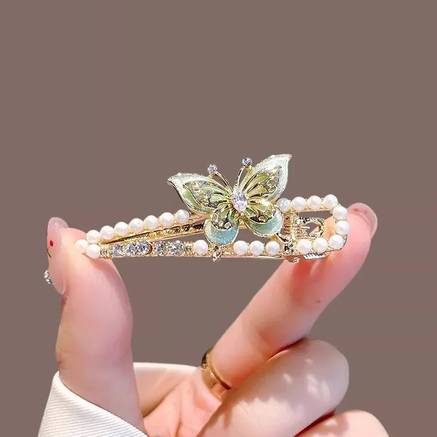 Feenhafte Perlen-Strass-Schmetterling-Haarspange Hochwertige Damen-Seitenfransen-Klammer Metall-Entenschnabel-Clip Modische Mädchen-Haaraccessoires
