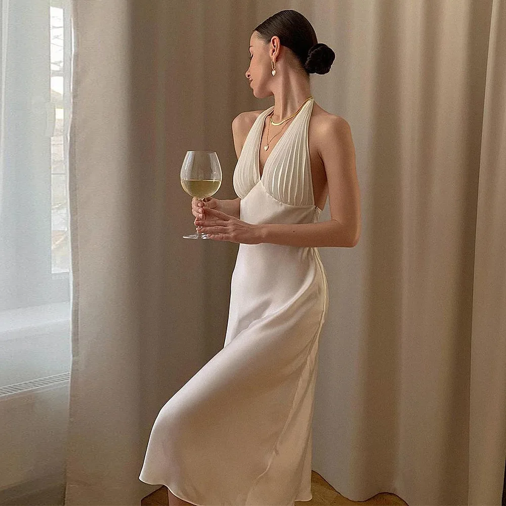 

Sexy high-waisted suspender-type sleeveless V-neck one-step skirt pleated dress fashionable and simple temperament elegant and v