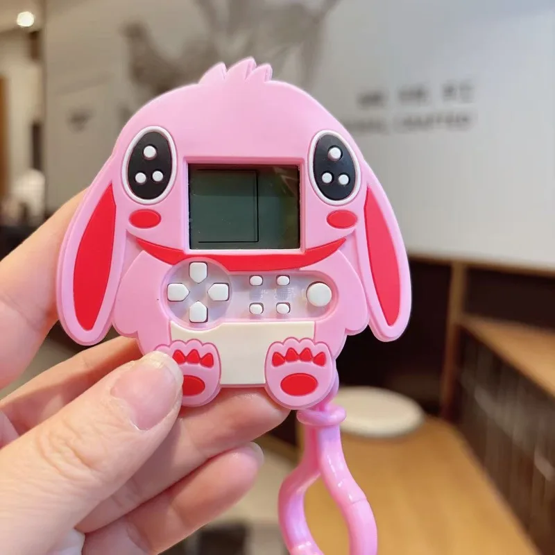 漫画スティッチゲーム機キーホルダー減圧テトリスゲームバッグペンダントカップルギフト