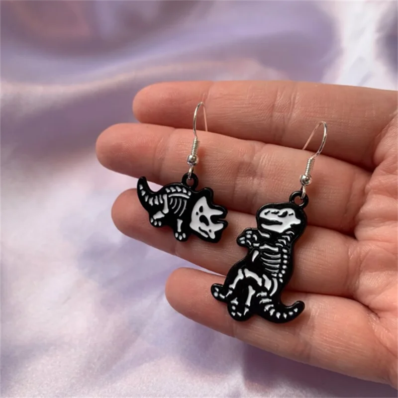 

Cool Quirky Dinosaur Trex and Triceratops Black and White Cartoon Skeleton Drop Dangle Earrings Handmade on Silver Plated Hooks