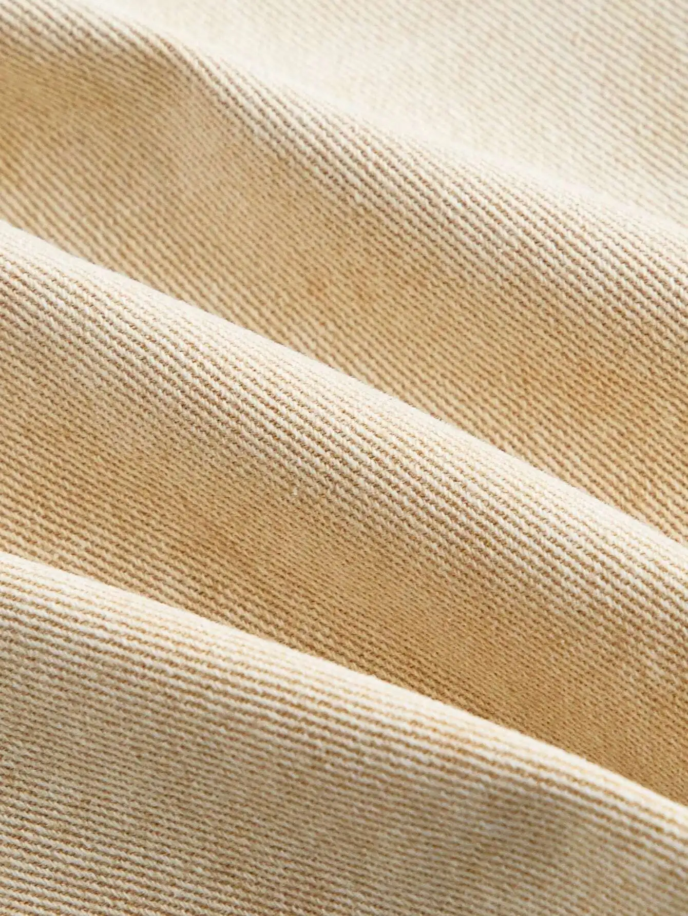 Jupe en jean courte pour femme, délavée, boutonnée sur le côté, avec ourlet asymétrique