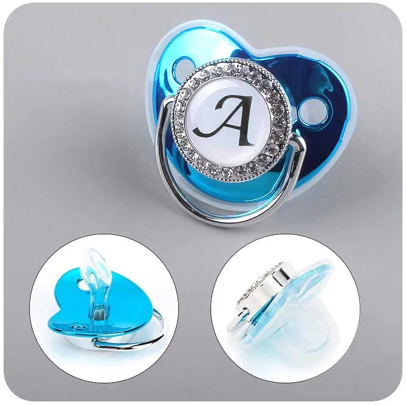 New blue 26-letter metal soother with dust cap Drilled pacifier photo accessory Baby teether toy without chain