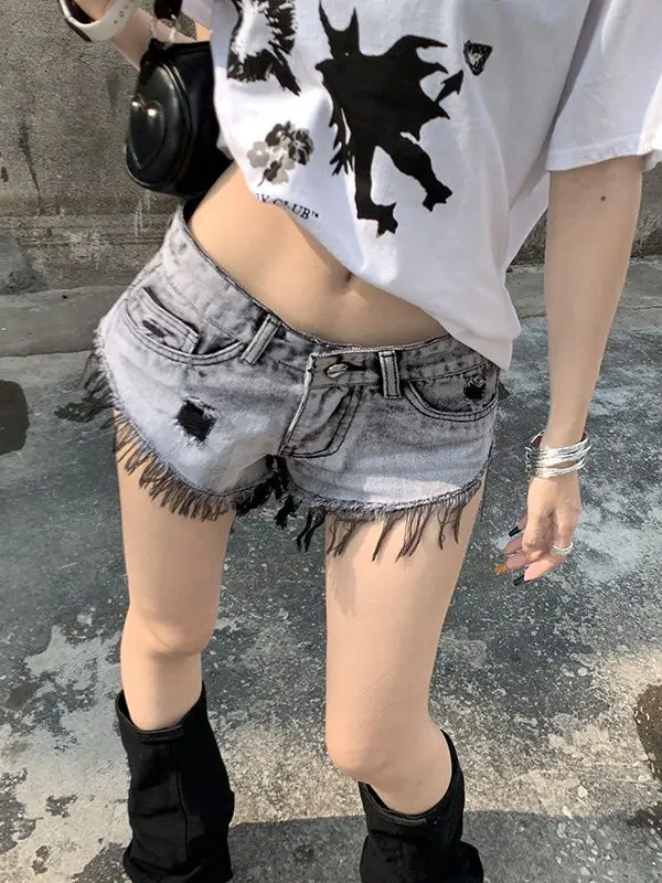 뜨거운 소녀 찢어진 술 Furrowed 울트라 짧은 청바지 여성의 낮은 허리 느슨한 넓은 다리 바지