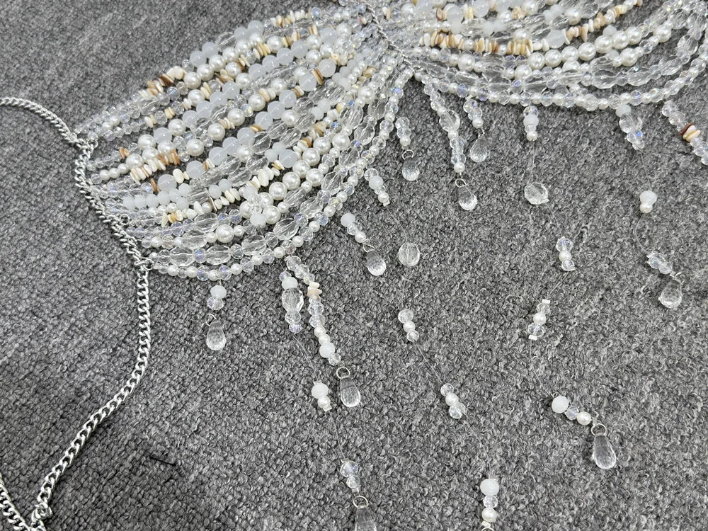 حمالة صدر جديدة لعام 2025 مع شرابة للنساء سترة مثيرة وجذابة على شكل سلسلة صدرية مفرغة ملابس شاطئ للعطلات y2k صيفية