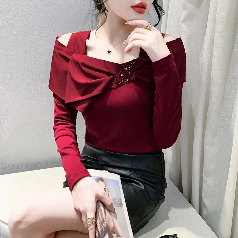 เสื้อยืด MadBlack-Women สไตล์ยุโรป คอเฉียงผูกโบว์ประดับลูกปัด เซ็กซี่ สตรีทแวร์ แขนยาว ทรงเข้ารูป ไซส์ M-3XL รุ่นใหม่ประจำฤดูใบไม้ร่วงปี 2025 รหัสสินค้า T59413CC