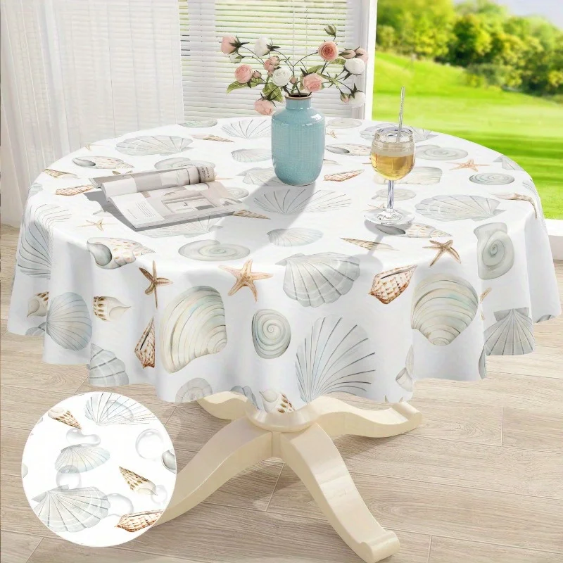 One round polyester tablecloth - with a pattern of seashore breezes, shells and starfish.