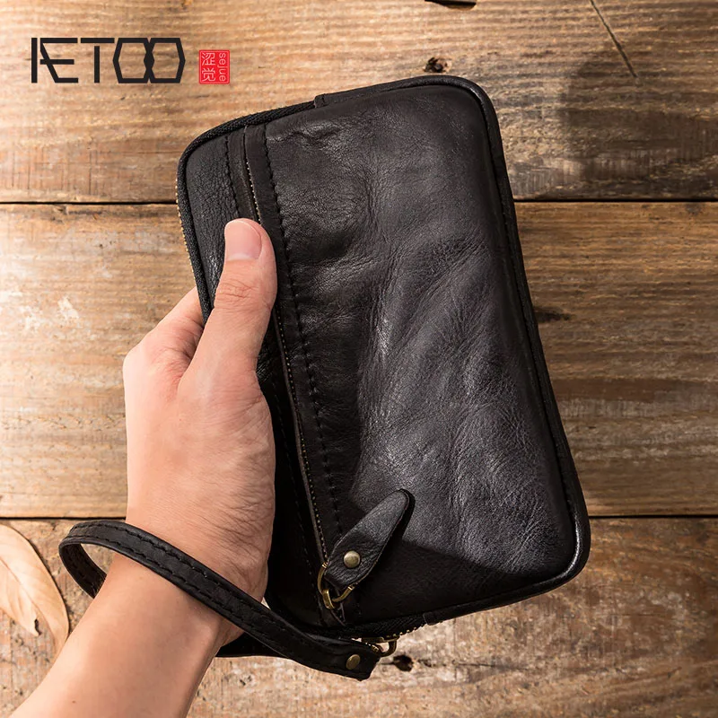 AETOO Men's leather wallet, handmade retro multifunctional cowhide zipper clutch, trendy personality clutch