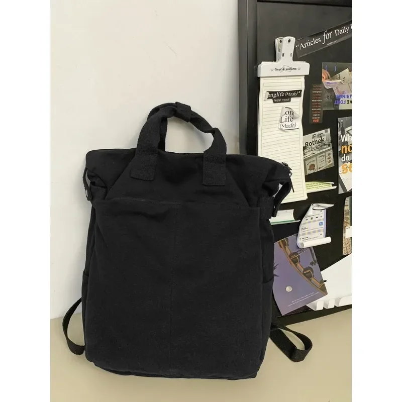 Simple Solid Canvas School Bag High Capacity Backpacks Practical Hand Bags 2024 Hot Sale Bags for Girls and Boys Mochila