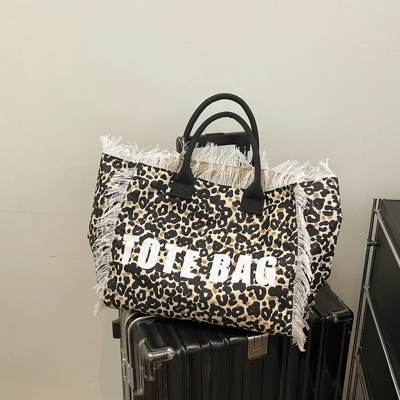 

Canvas Leopard Large Capacity Tote Bag Tassel Beach Fashion Women's Bags 2025 High Quality Letter Vacation Women's Handbags