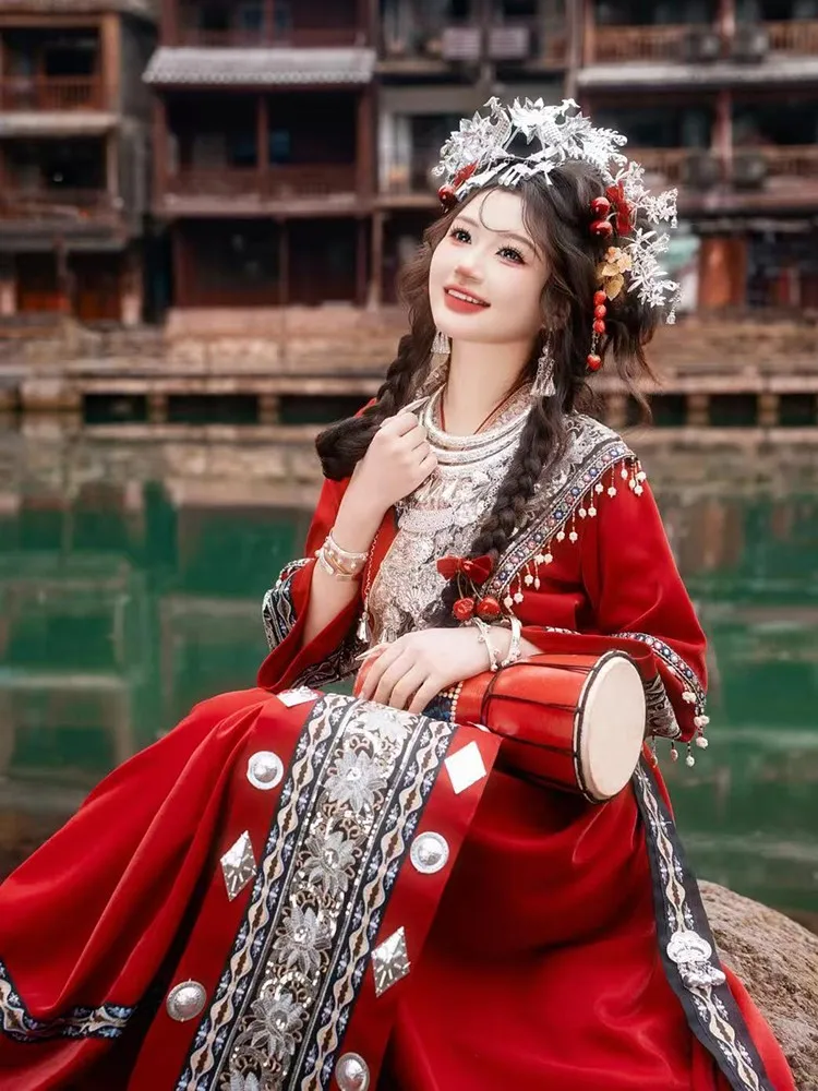 

Travel photography in a red exotic performance costume set