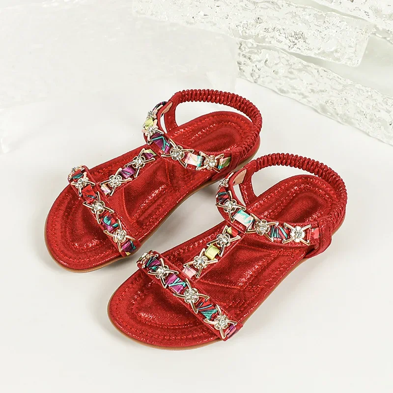 Nuevas sandalias de suela blanda para niños, zapatos de princesa a la moda con diamantes de imitación para niñas, zapatos planos de verano para la playa informales para niños