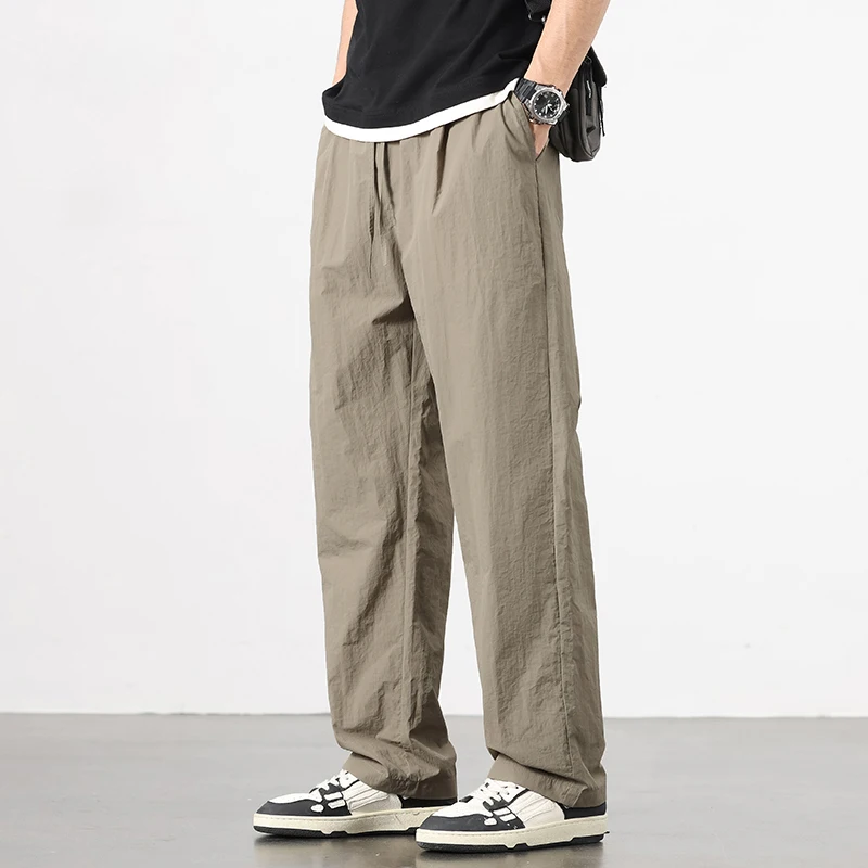 الحرير الجليد الرجال السراويل 2025 صيف جديد أسود رمادي رقيقة الأعمال سراويل تقليدية في الهواء الطلق مرونة تنفس مستقيم الساق Sweatpants
